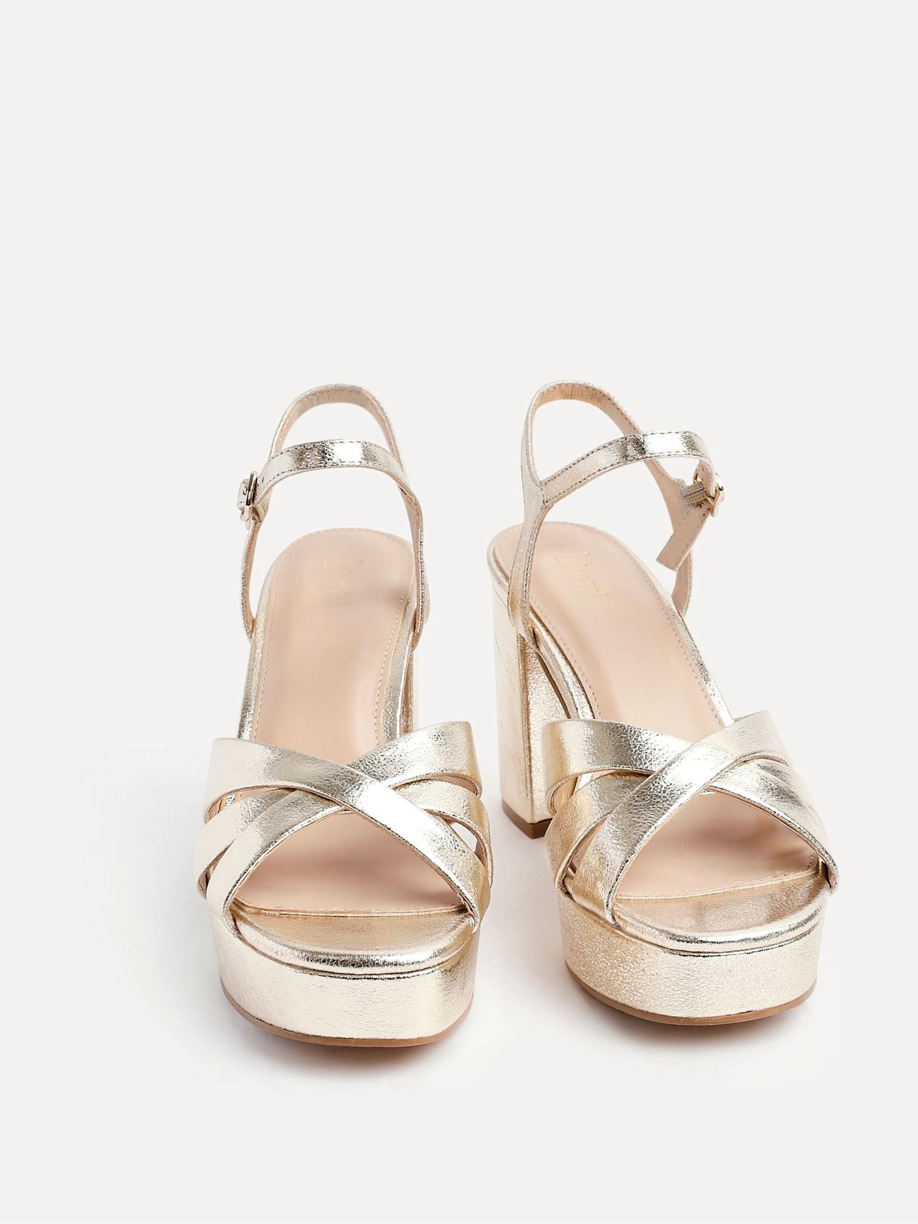 Goud - Linzi Keliah sandalen met plateauzool, gekruiste bandjes en blokhak