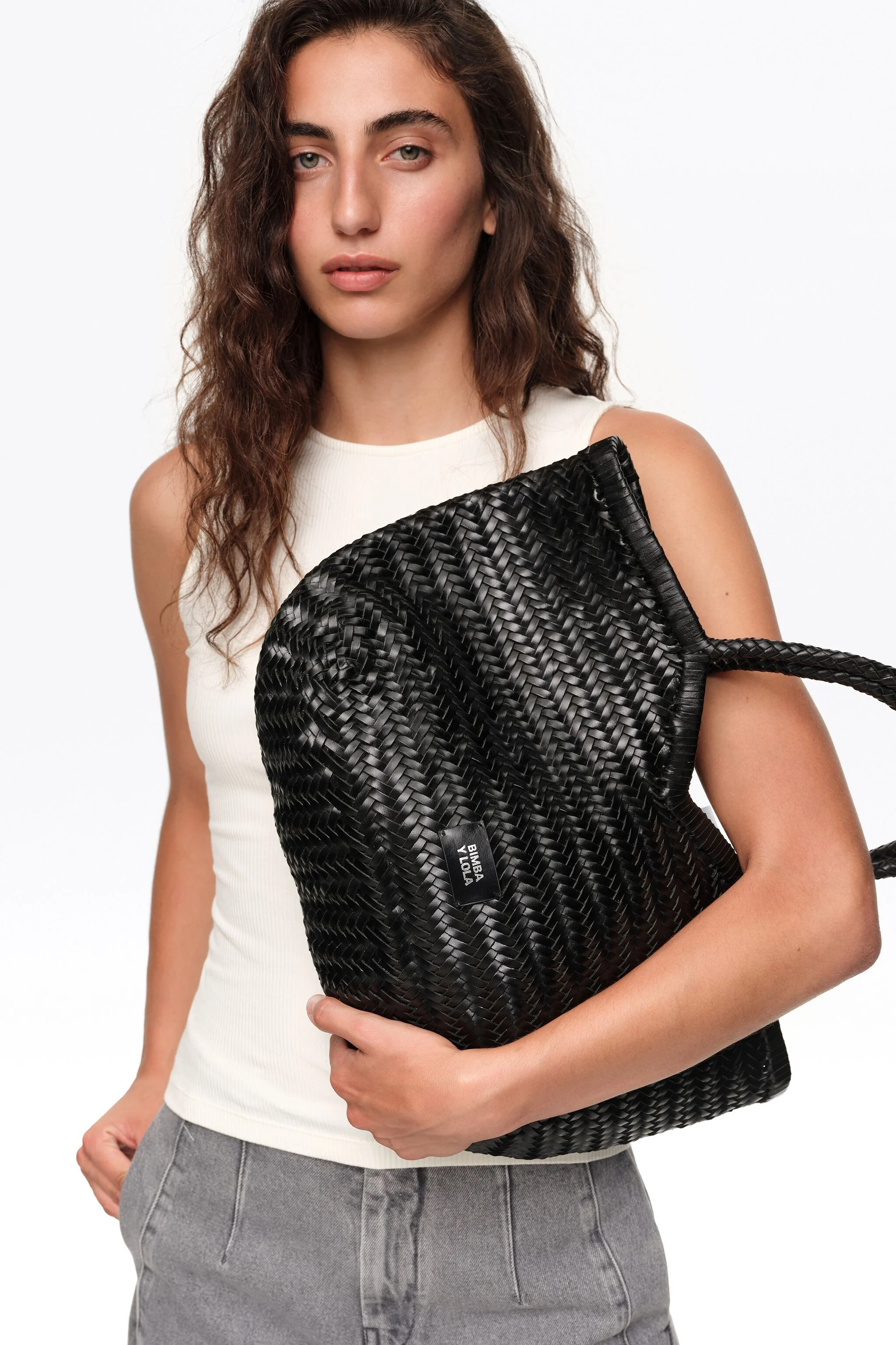Bolsa de compras grande em couro trançado preto
