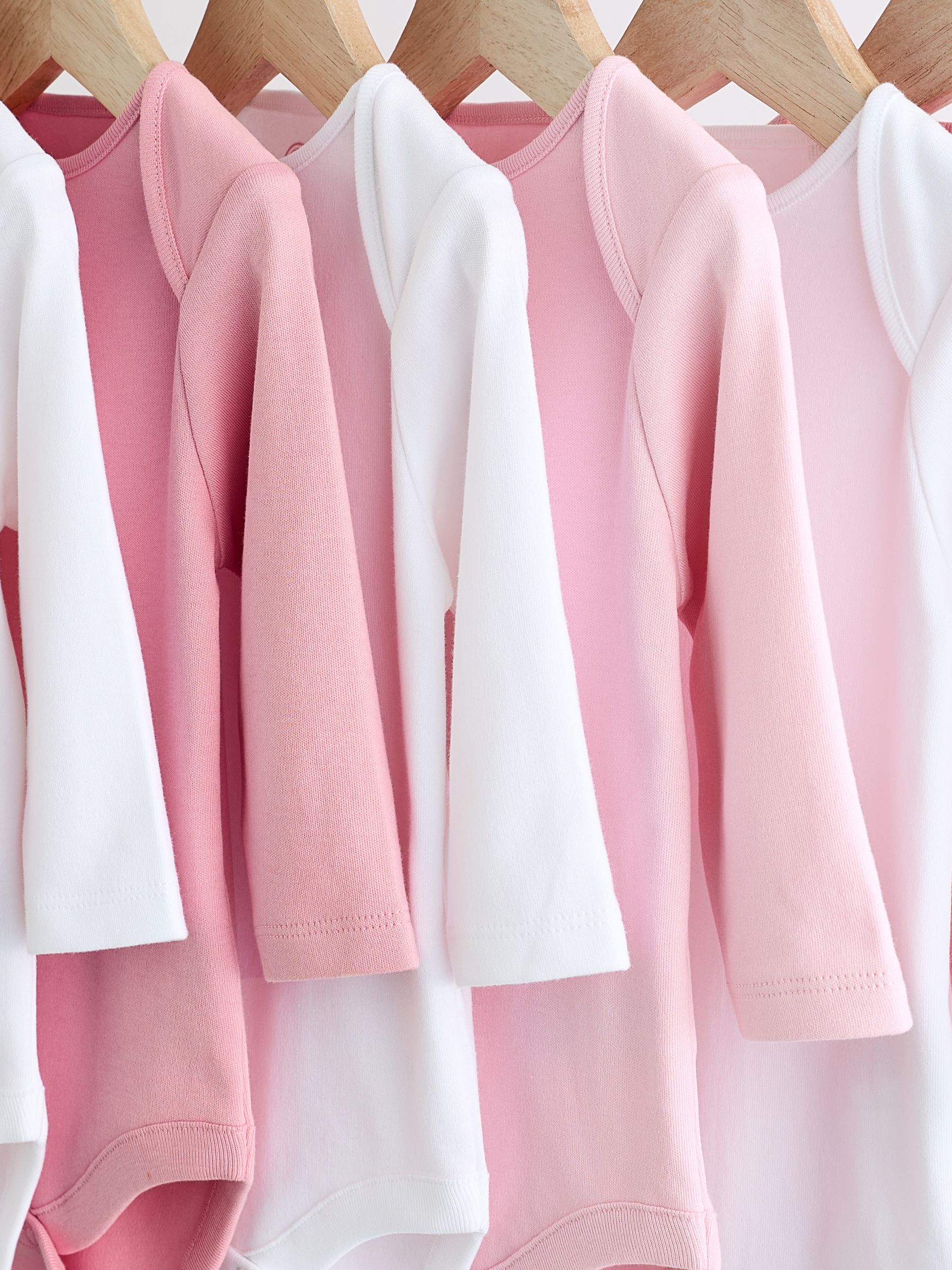 Roze/wit - Onmisbare rompertjes met lange mouwen