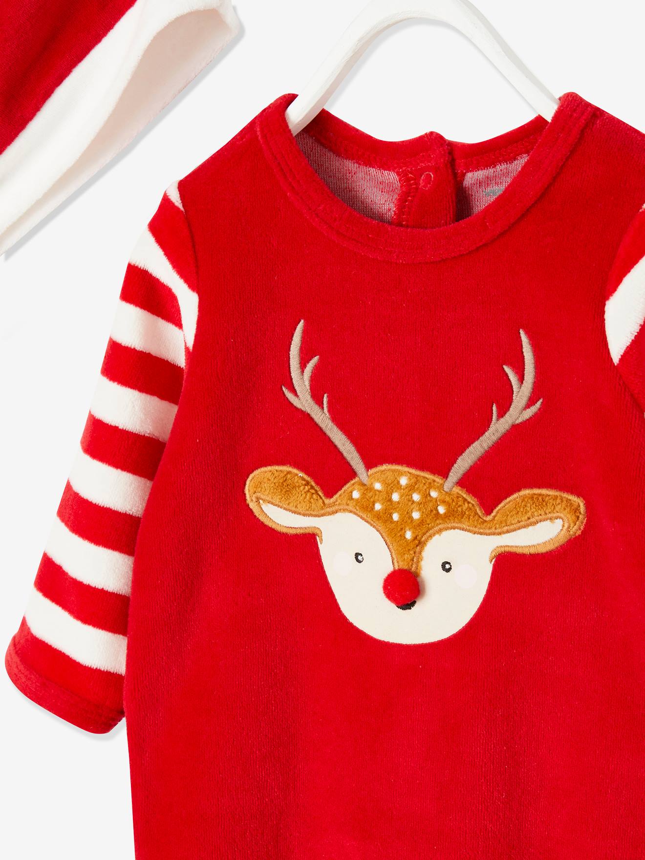 Conjunto de presente de Natal para bebê, composto por body e gorro, na cor vermelho escuro liso com estampas.