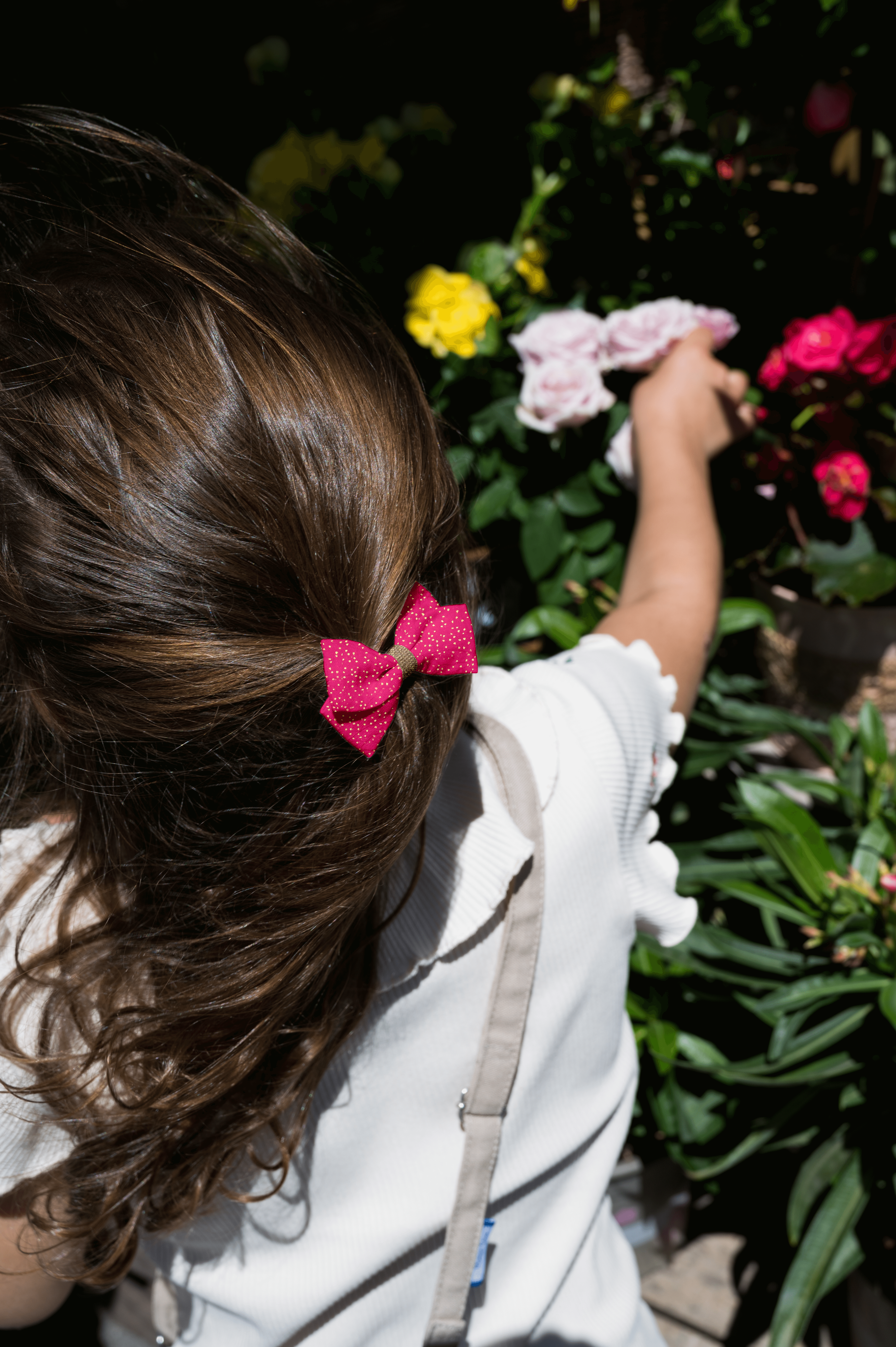 Petite Barrette Double Noeud Croisé Fuchsia Pailleté