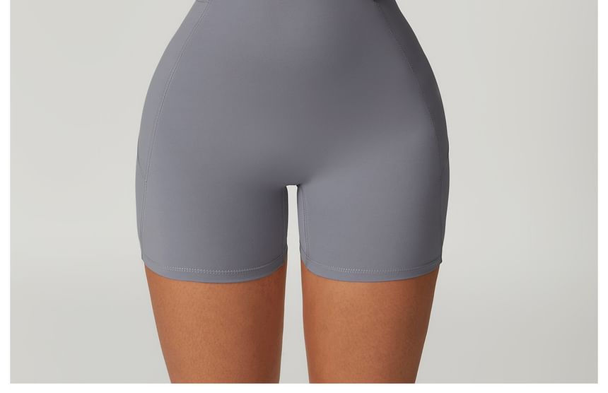 Skinniano - Yoga romper met spaghettibandjes en effen paneel