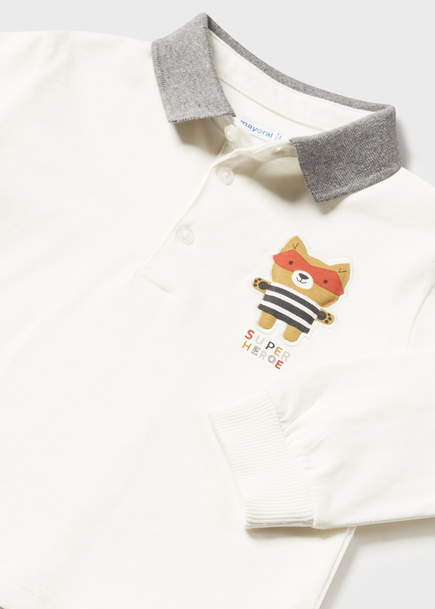 Camisa polo infantil Better Cotton com apliques