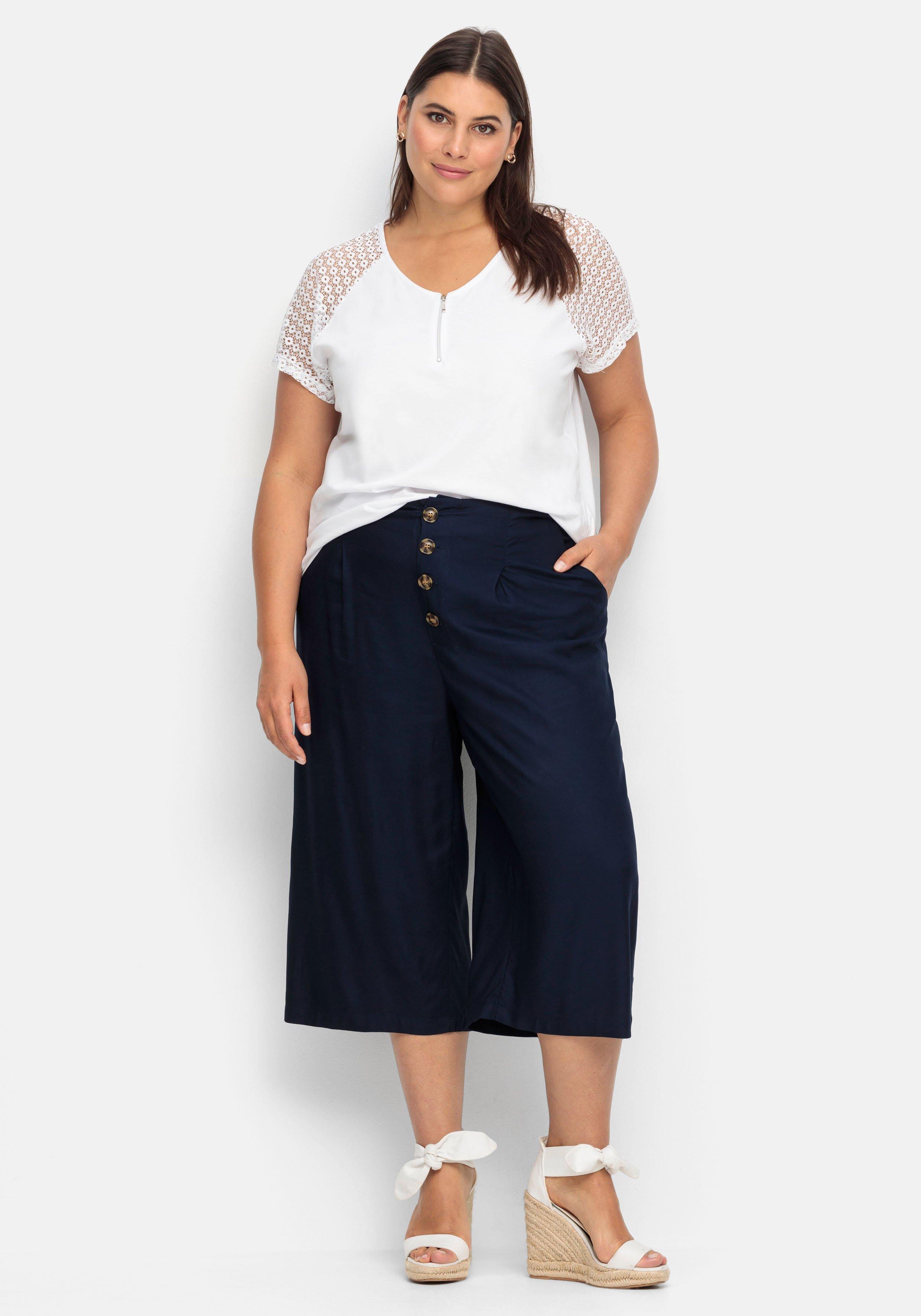 Shirt mit Zipper am Ausschnitt und Ärmeln aus Spitze