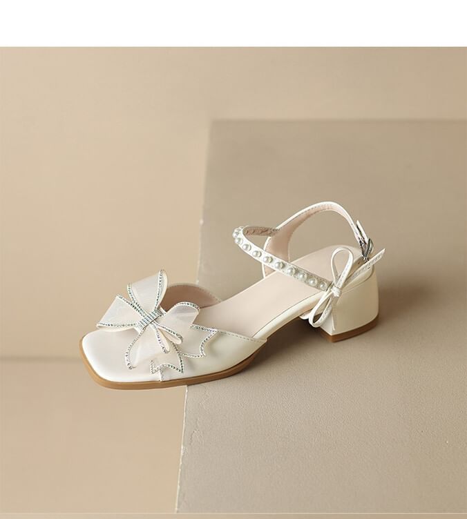 Niuna - Sandalen met strik en dikke hak