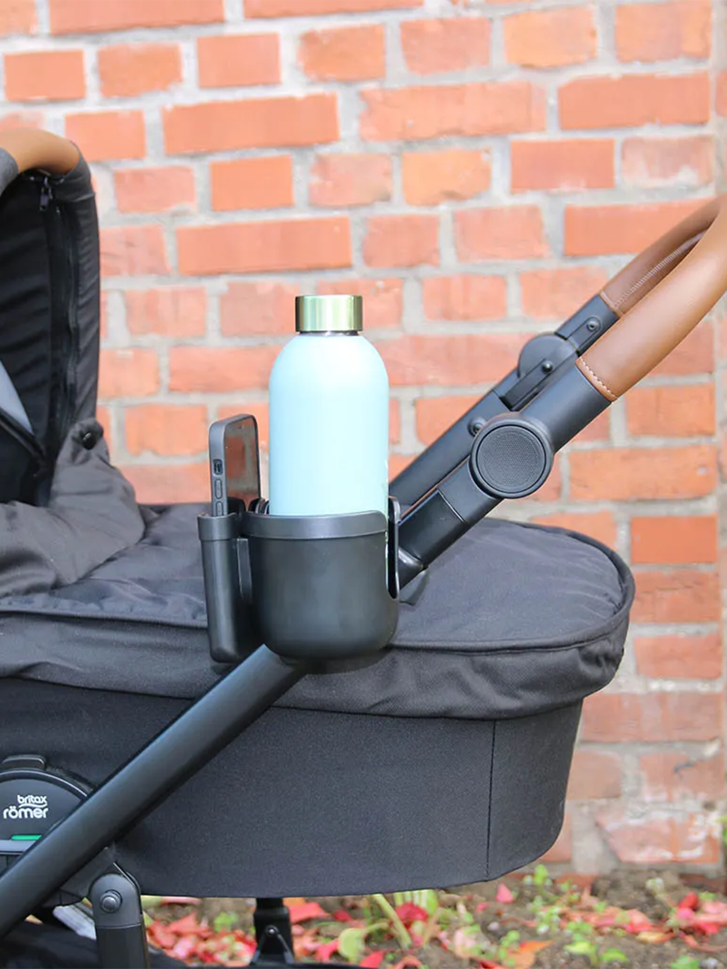 Koppholder med mobillomme