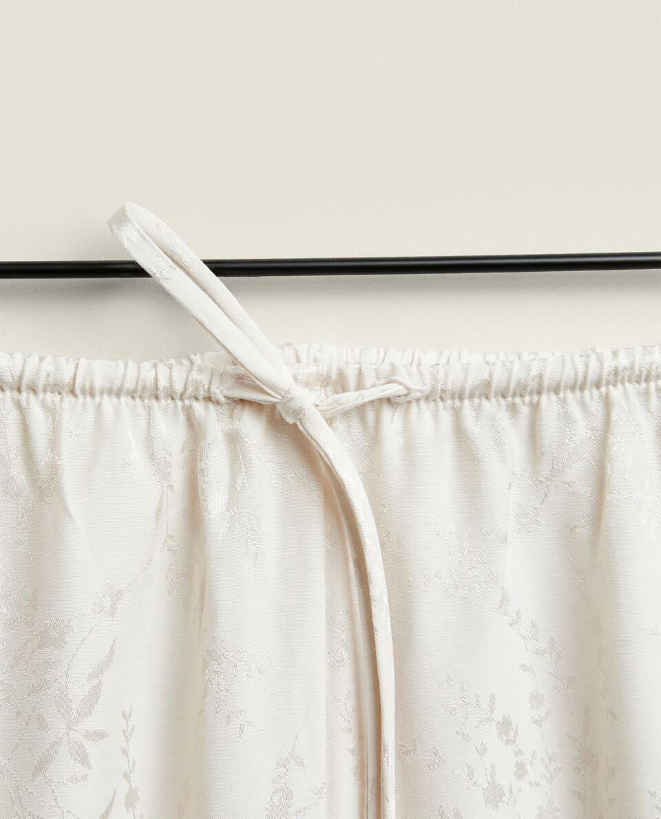 CALÇAS JACQUARD