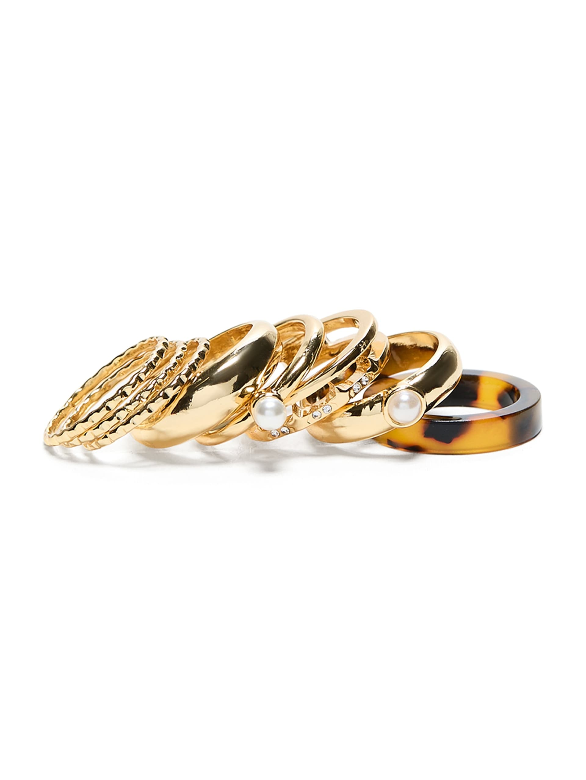 Conjunto de anéis empilháveis em tom dourado