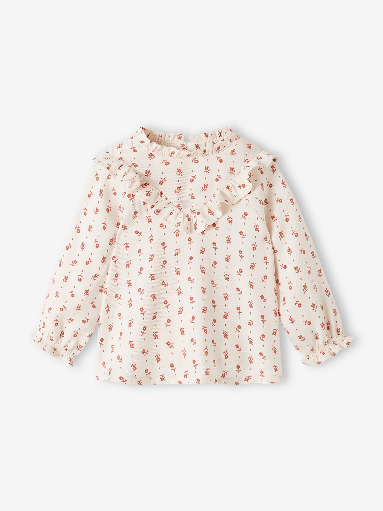 Blusa fluida com estampa floral para bebê na cor cru.