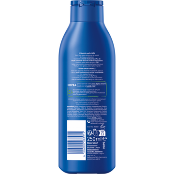 NIVEA Verzorgende Body Milk - met Hyaluronzuur Zachte Amandel Olie en Voedend serum - Body Melk met 72 Uur Hydratatie - Voor Droge tot Zeer Droge Huid - 250ml