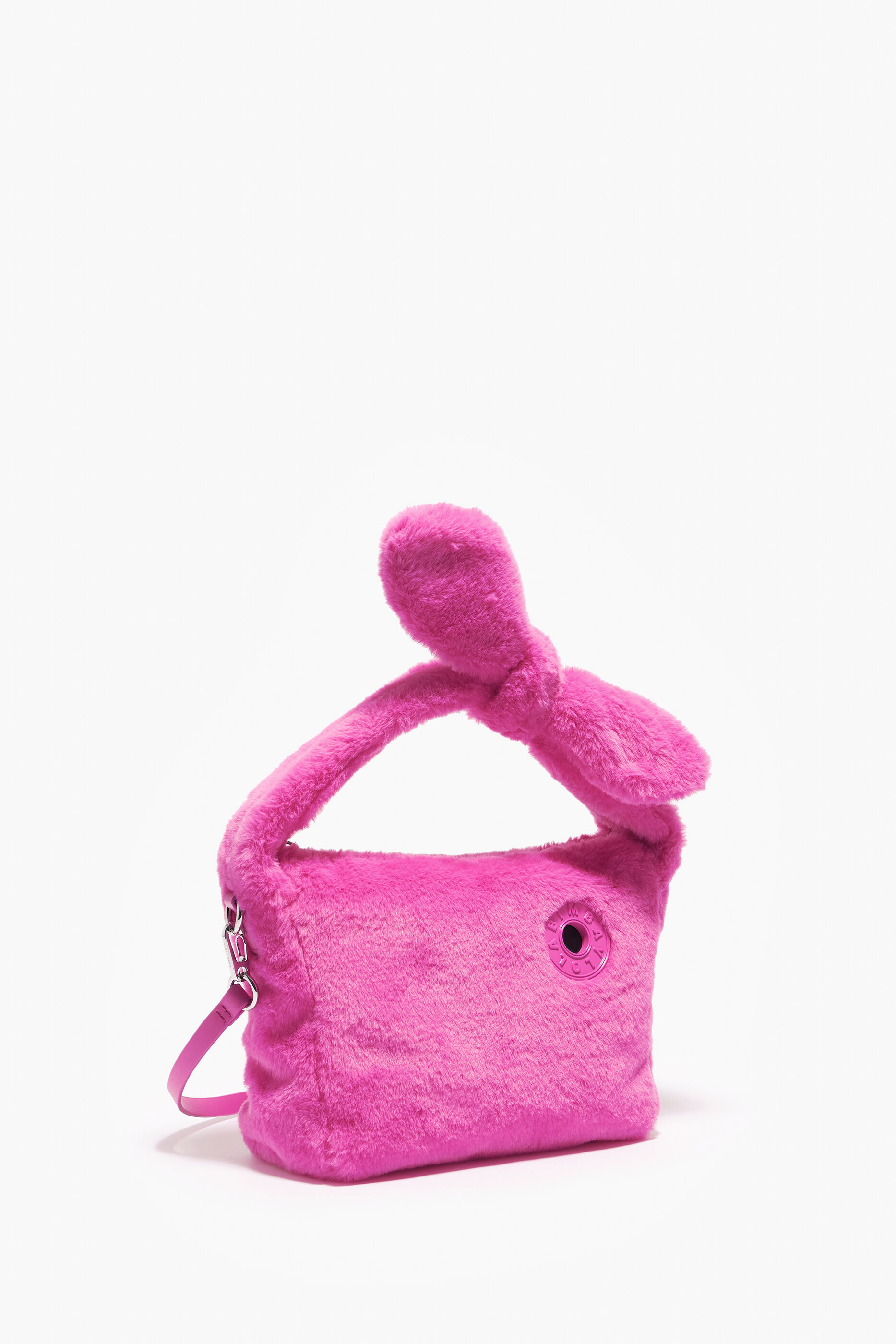 Bolsa hobo tamanho P com forro de pele rosa.