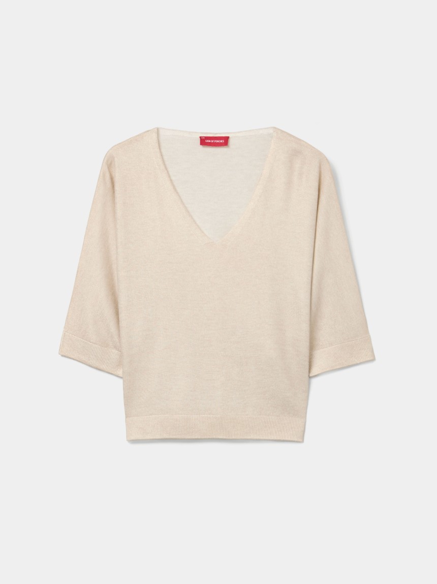 Camisola de malha dourada