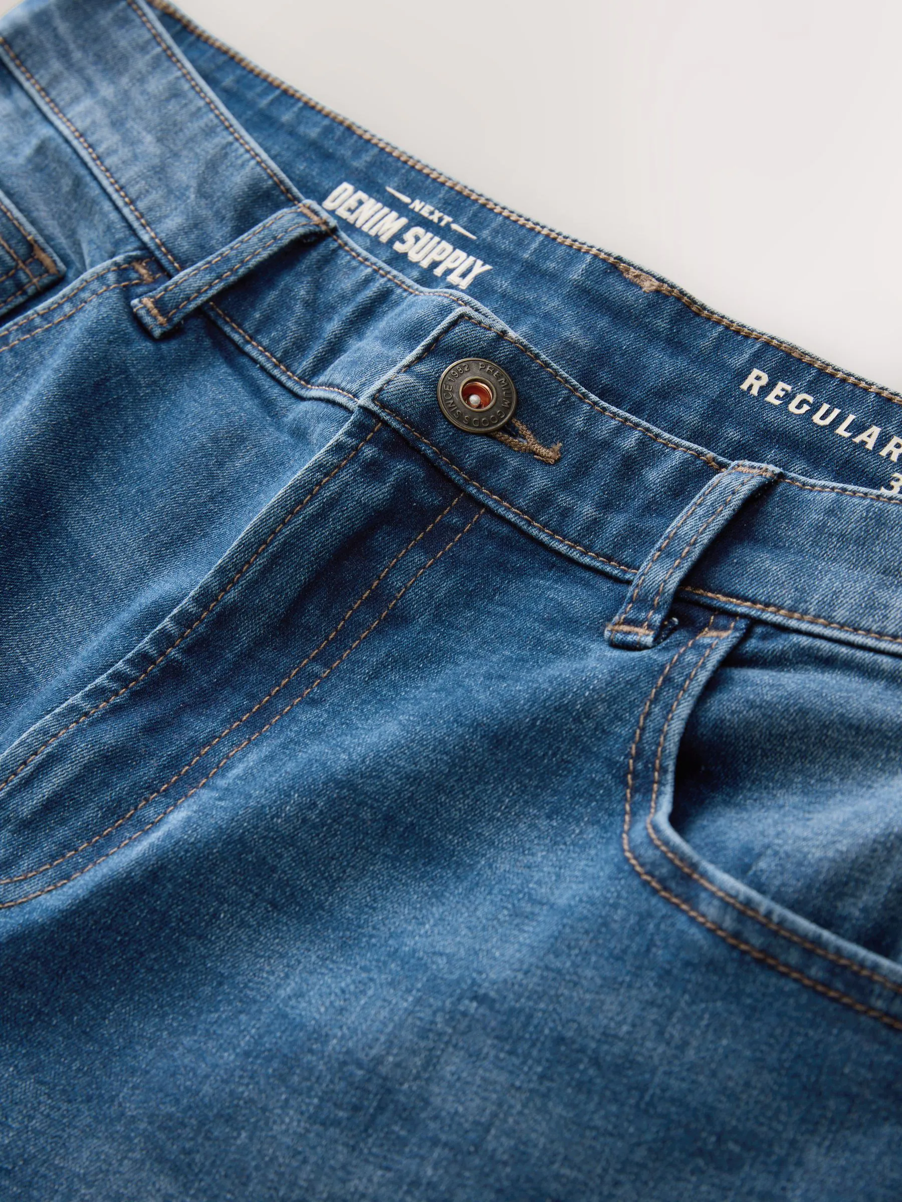 Blauw - Klassieke stretchjeans met standaard taps toelopende pasvorm