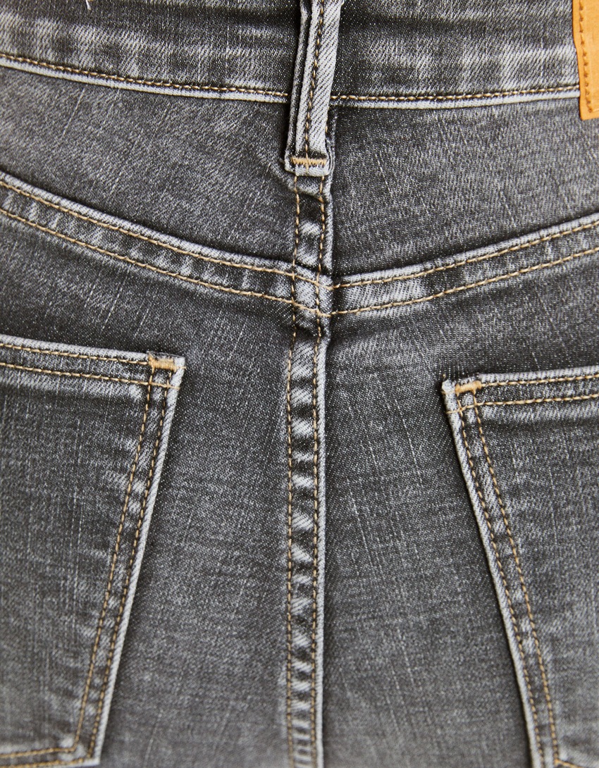 calça jeans skinny de cintura super alta