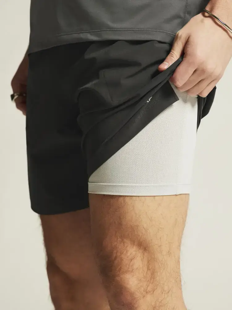 Craft ADV Essence 2 2-IN-1 Hardloopbroek Kort Zwart Heren