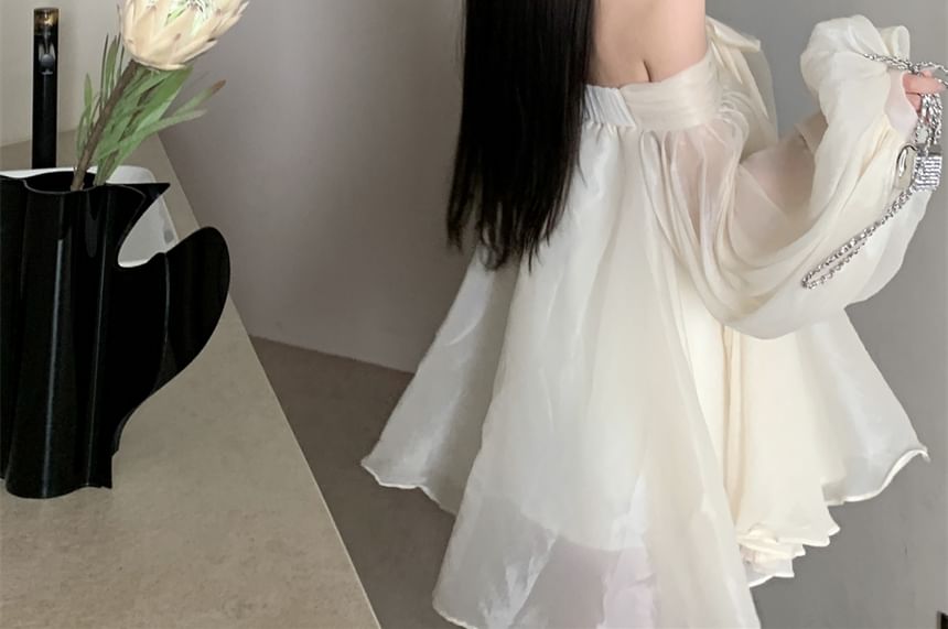 Odestra - Lange mouw off-shoulder effen mini A-lijn jurk