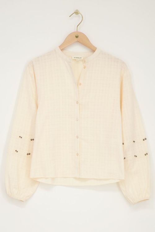 Beige blouse met tapes en studs