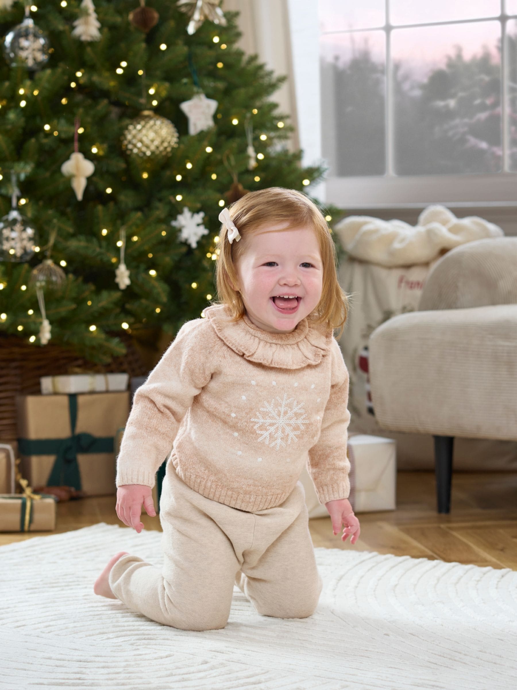 Roze met sneeuwvlokprint - Mamas & Papas Kersttrui