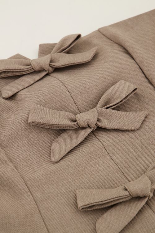 Beige corset top met strikjes