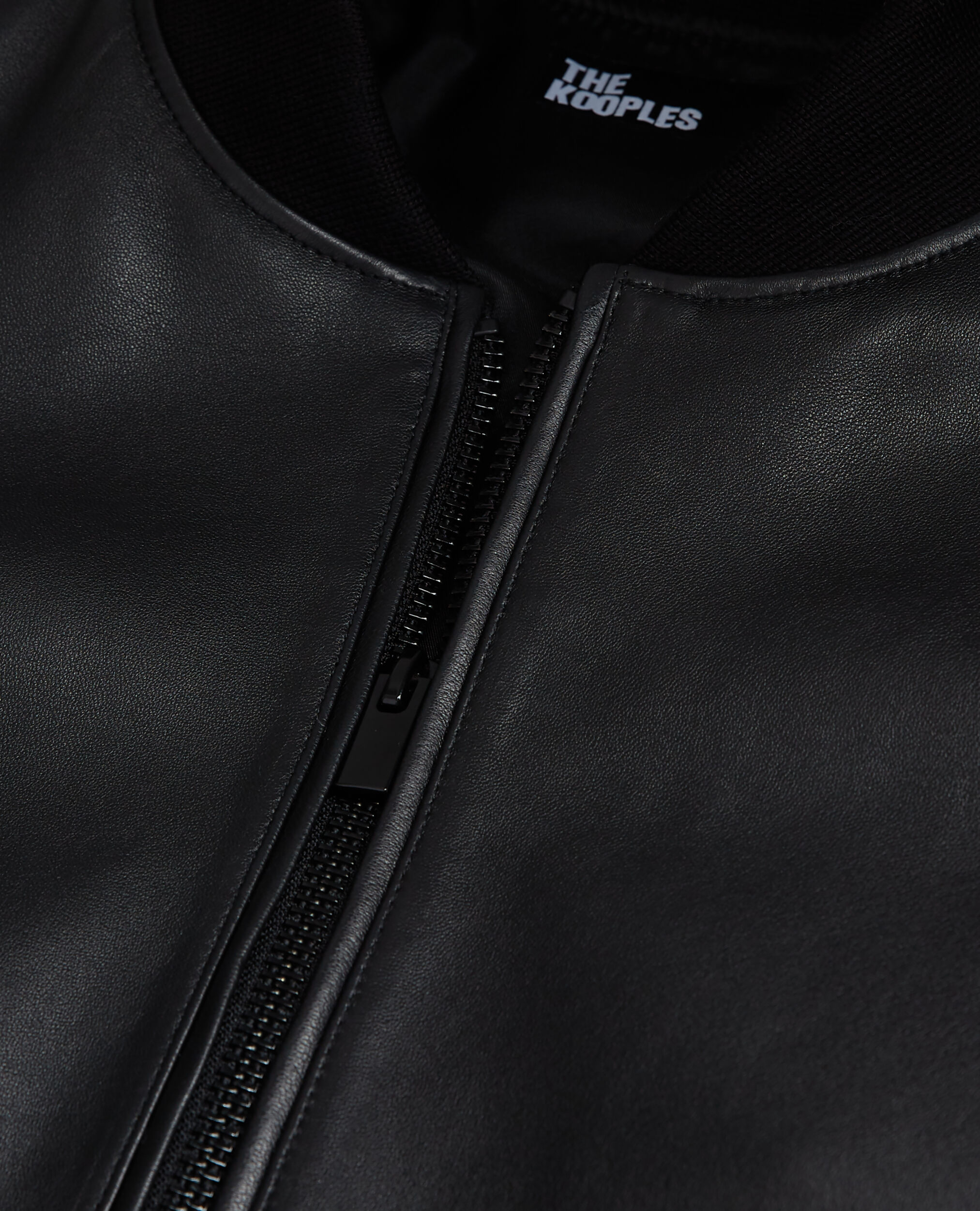 Blouson détails cuir noir