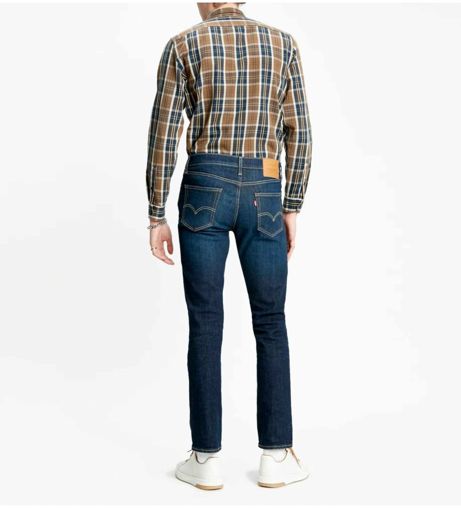 Calça jeans Levi's 511 azul, corte slim.