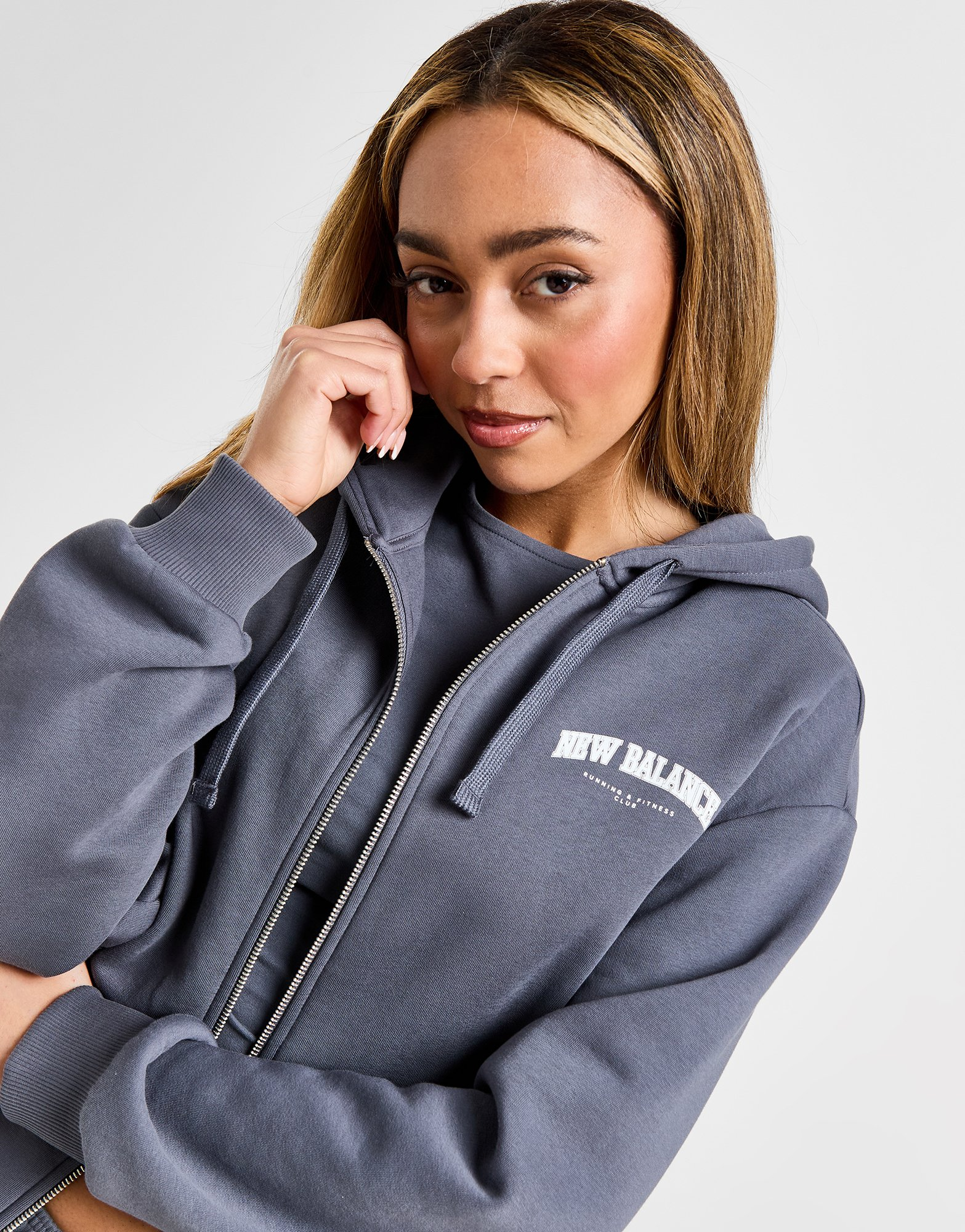 New Balance Sweat à Capuche Zippé Logo Femme