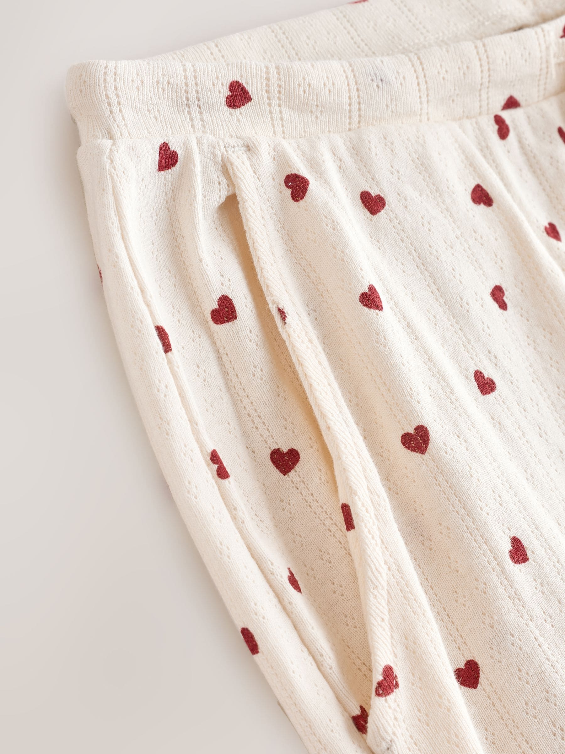 Crème met hartprint - Pointelle pyjama met lange mouwen