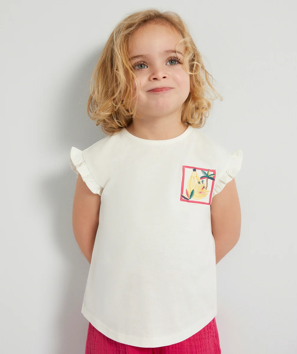 T-SHIRT ANTI-UV BÉBÉ FILLE EN COTON BIO ÉCRU AVEC BRODERIE ET VOLANTS