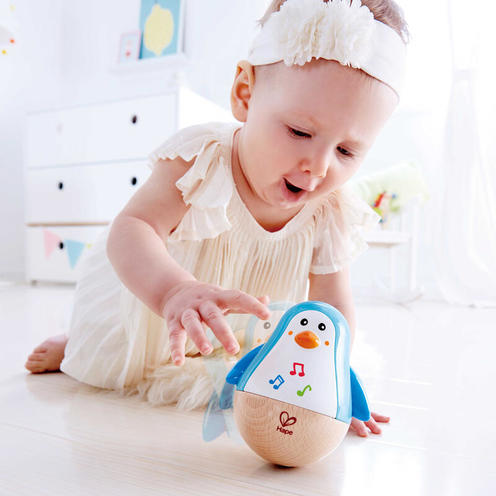 Pingouin culbuto musical Bois et multicolor - HAPE