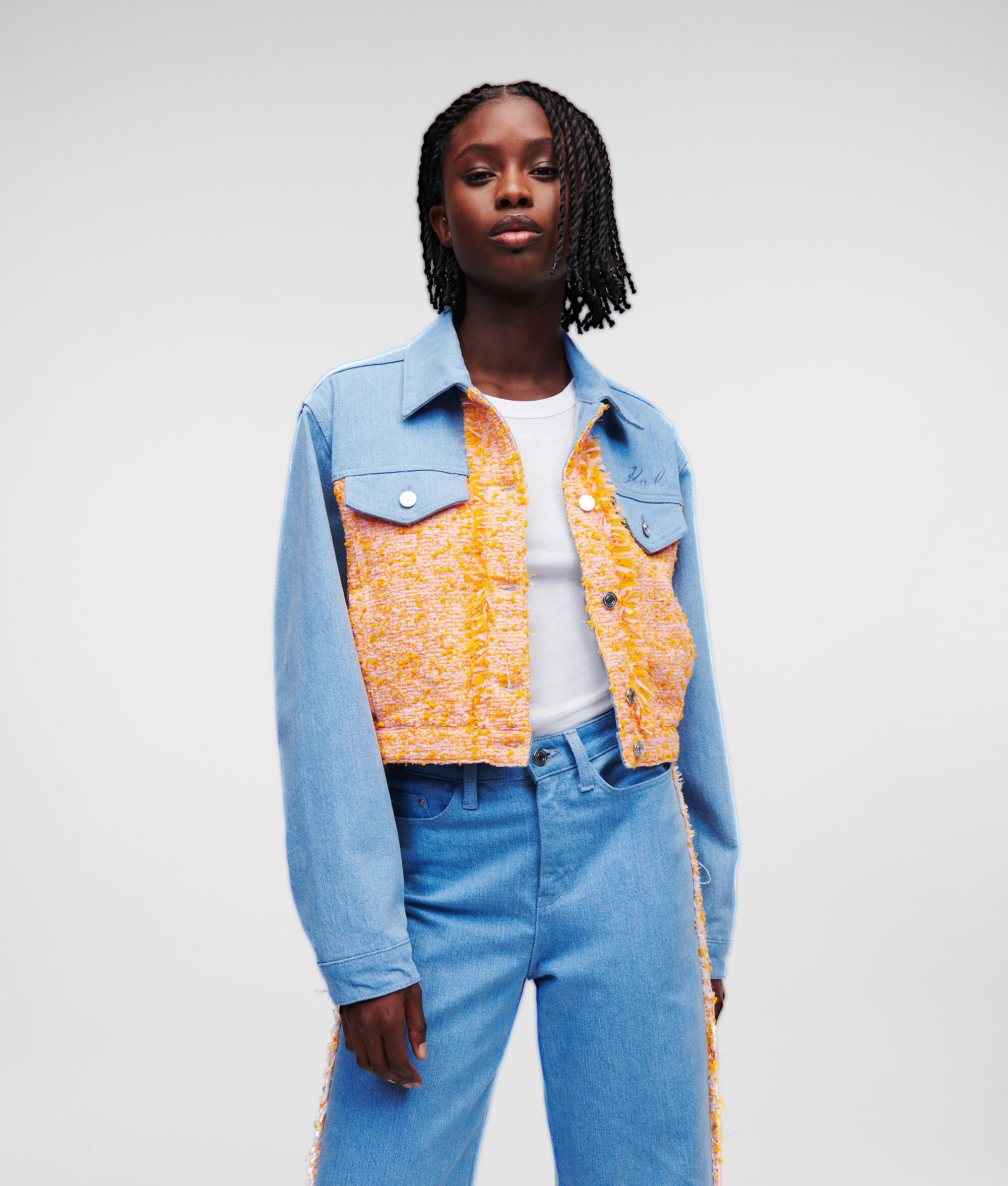 VESTE EN JEAN ET EN TISSU BOUCLÉ