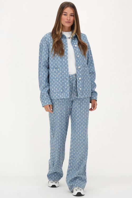 Blauw spijkerjasje met pailletten
