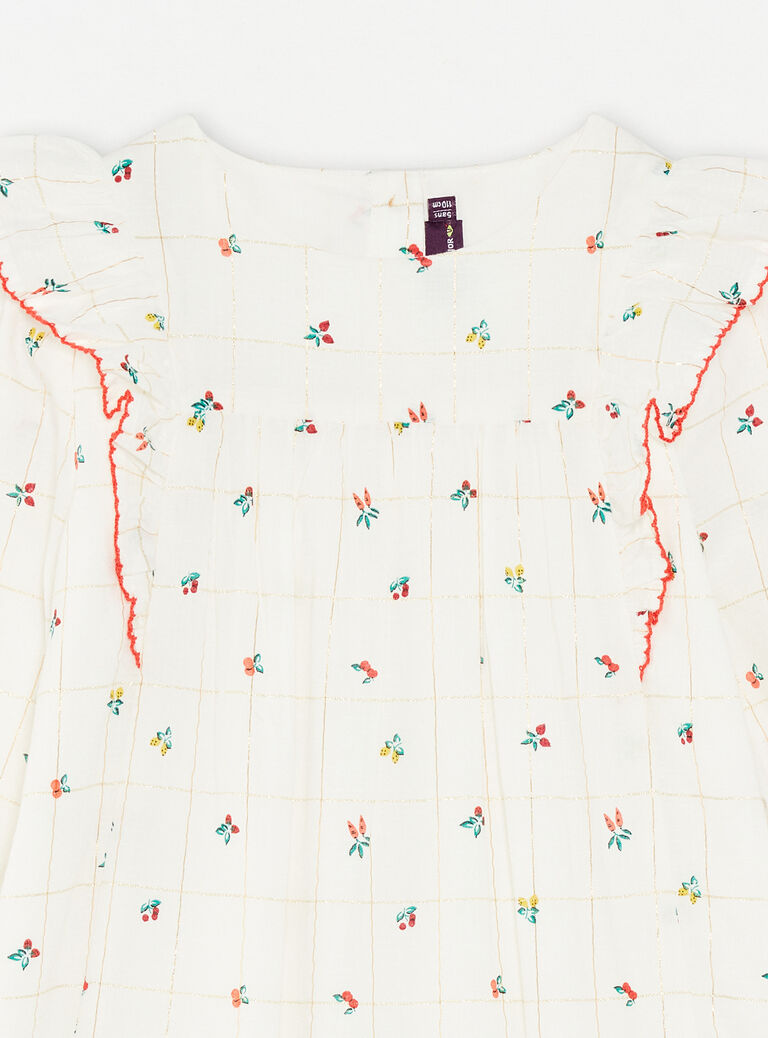 Robe écrue à volants