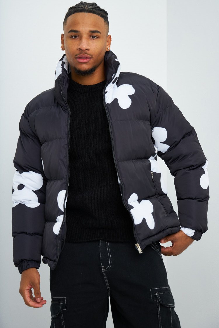 Doudoune noir et blanche matelassée à fleurs