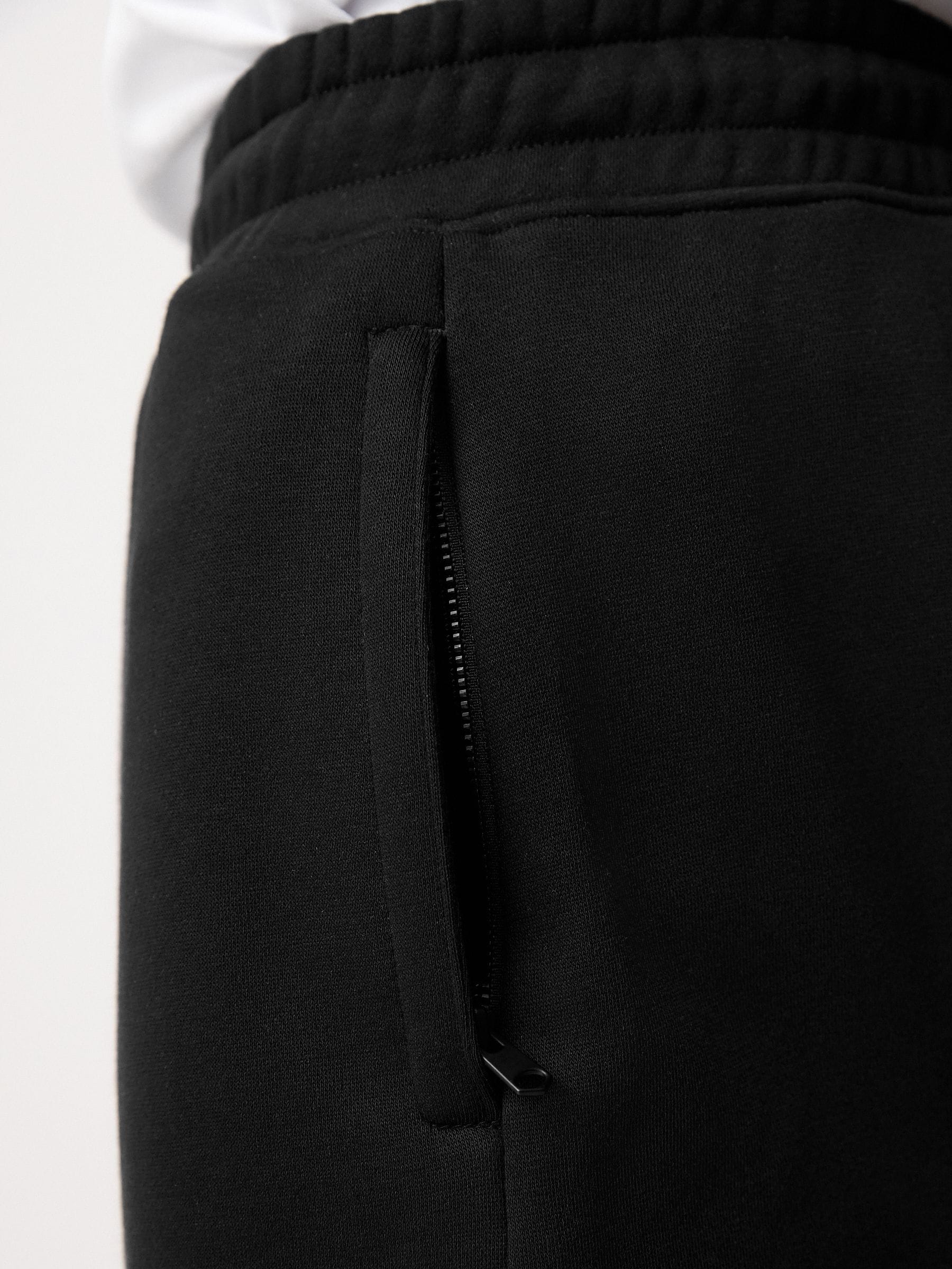 Zwart - Geborstelde jersey shorts met ritszakken