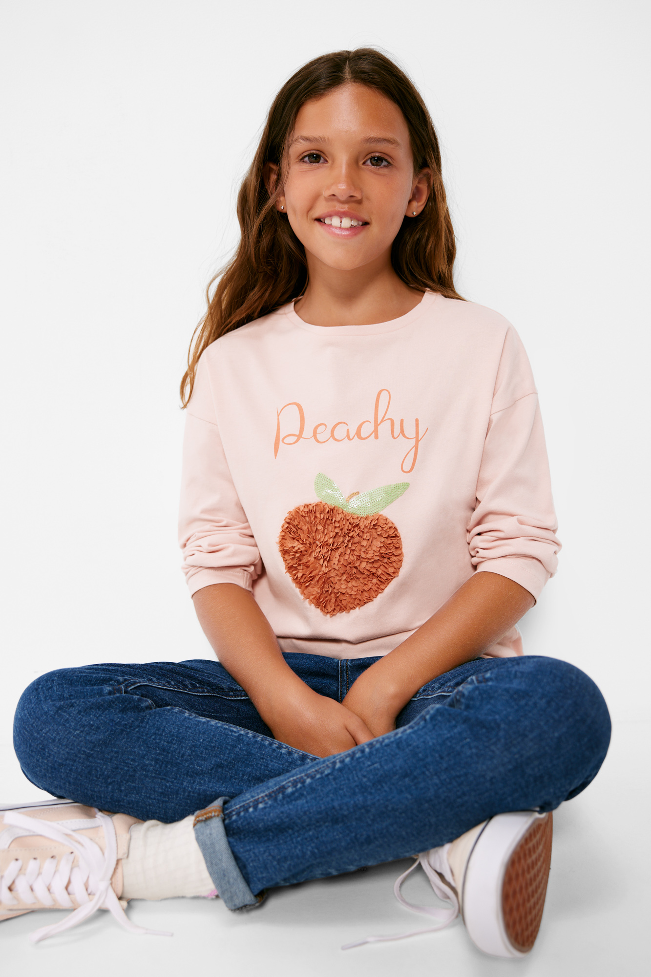 Camiseta cor de pêssego para meninas