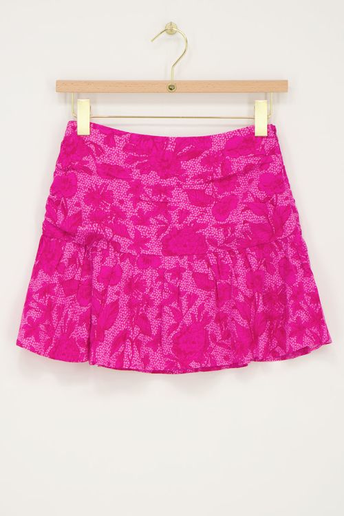 Roze skort met plooien en bloemenprint