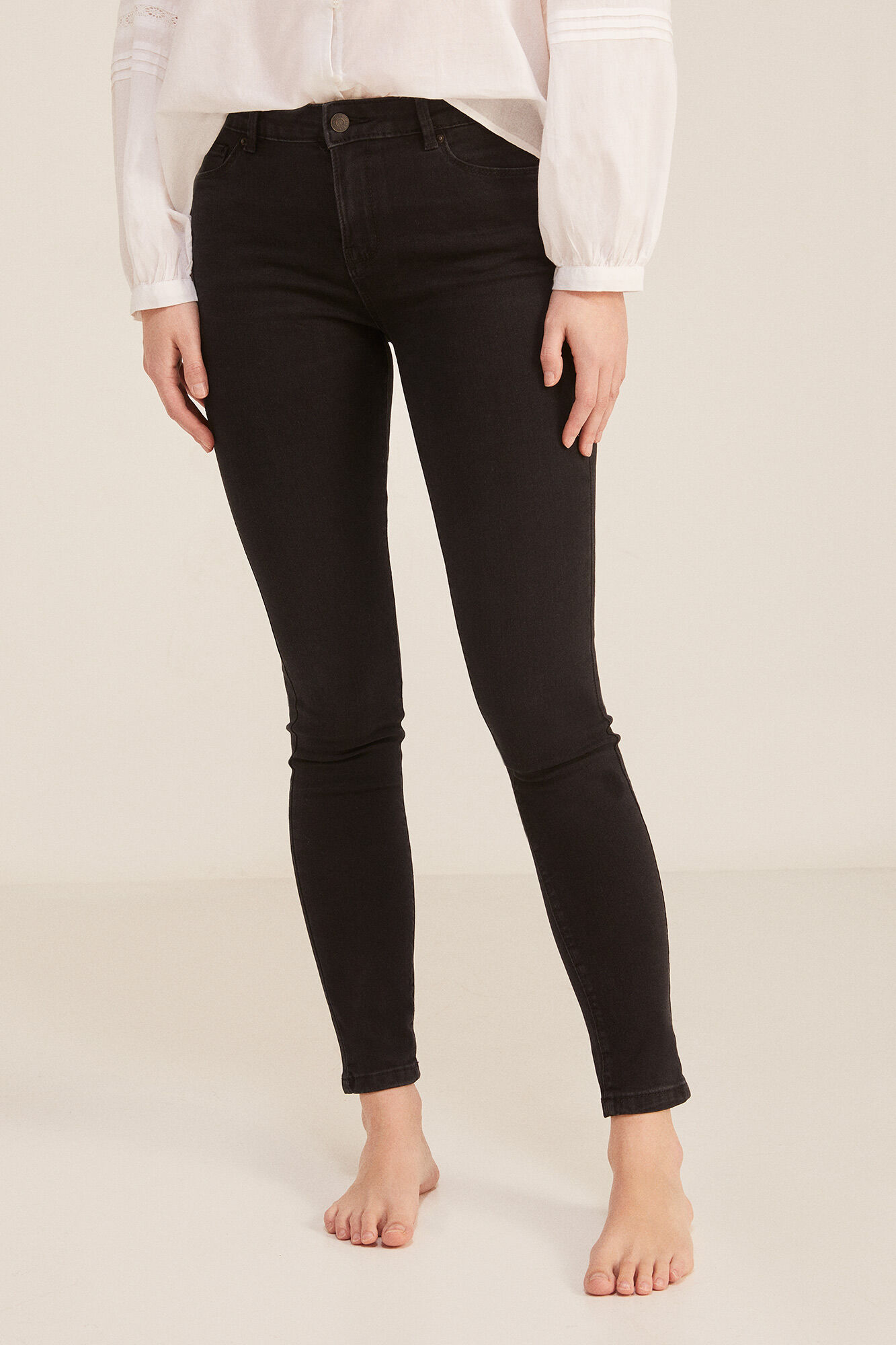 Calça jeans slim, lavagem sustentável
