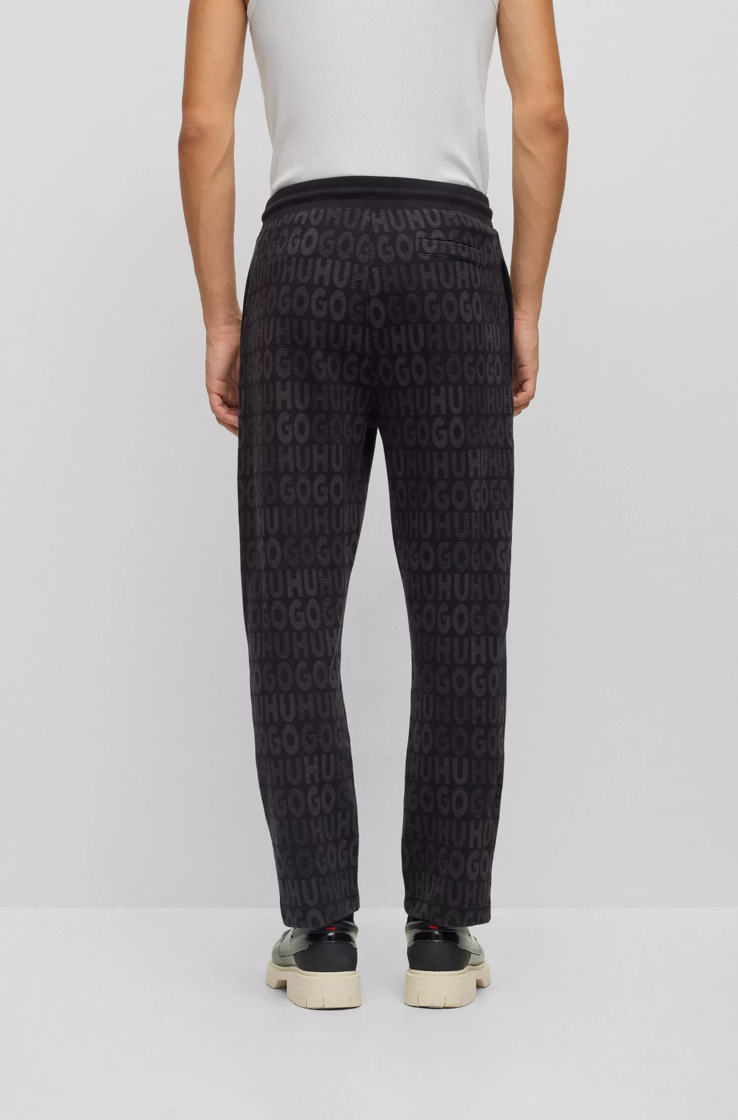 Calça de fato de treino HUGO em algodão vermelho com cintura ajustável por cordão e jacquard com monograma.