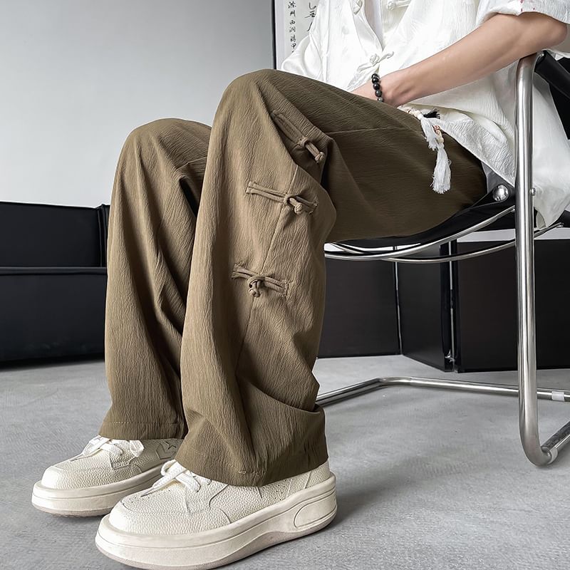Plummie - Effen broek met trekkoord, kwastjes en losse pasvorm met knoopjes