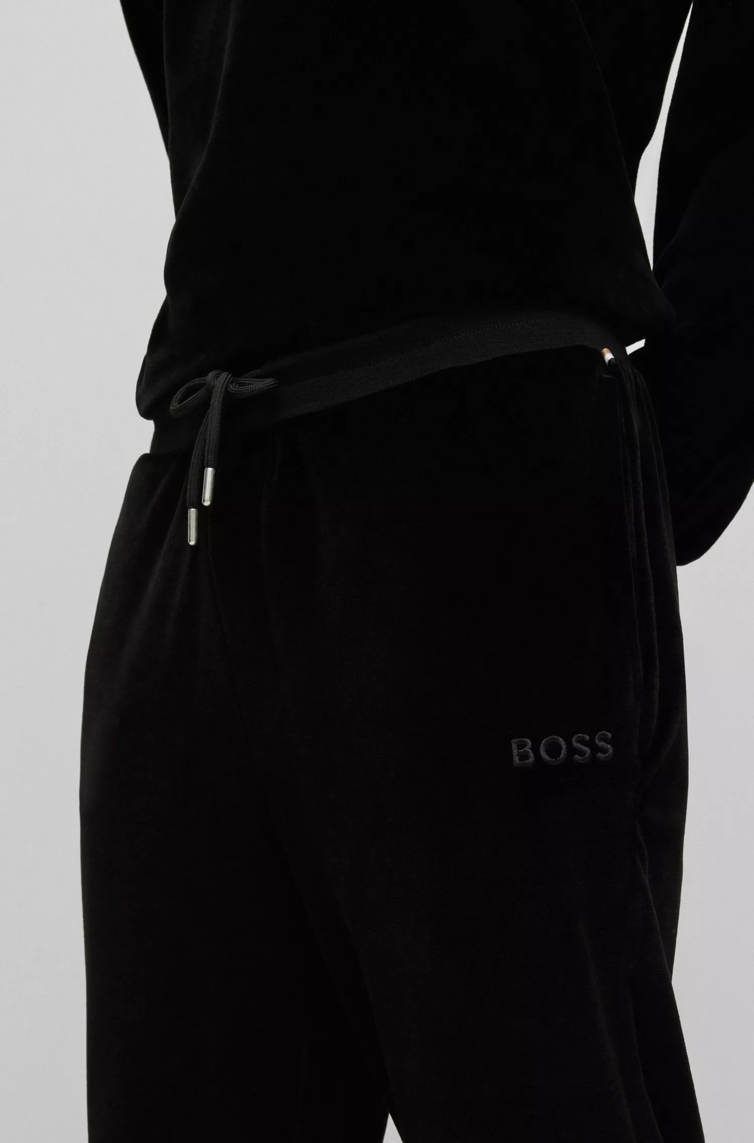 Calça de fato de treino BOSS em veludo preto e mistura de algodão com logótipo bordado
