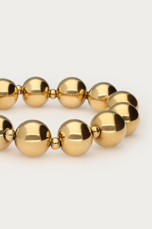 Goudkleurige elastieken armband chunky dubbele kralen