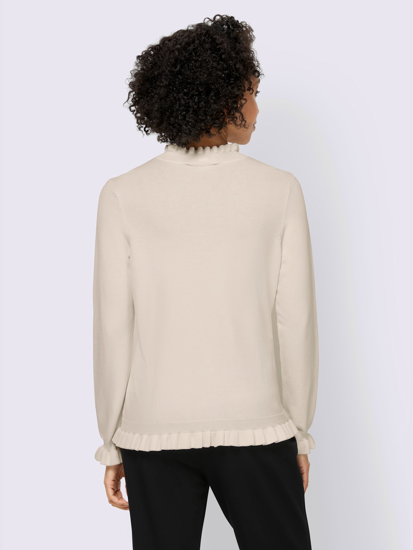Pull col montant, manches et ourlet à finitions ondulées