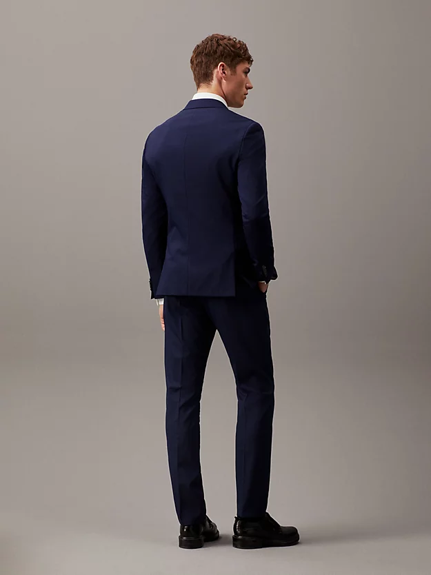 Blazer de abotoamento simples em lã elástica com modelagem slim.