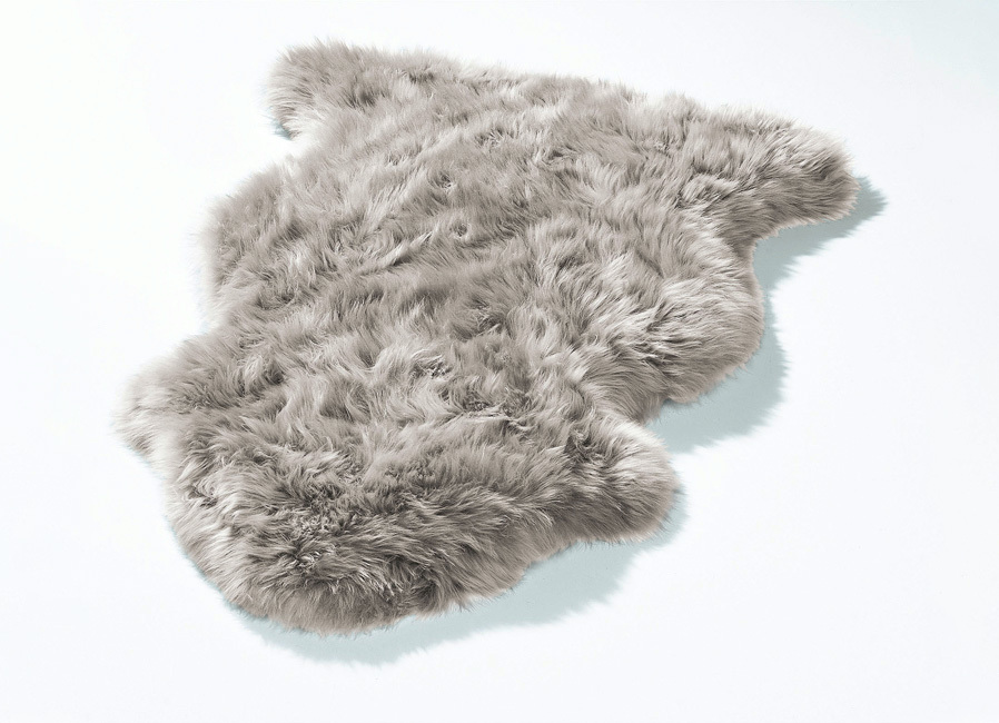 Vorleger aus echtem Lammfell in Tierform