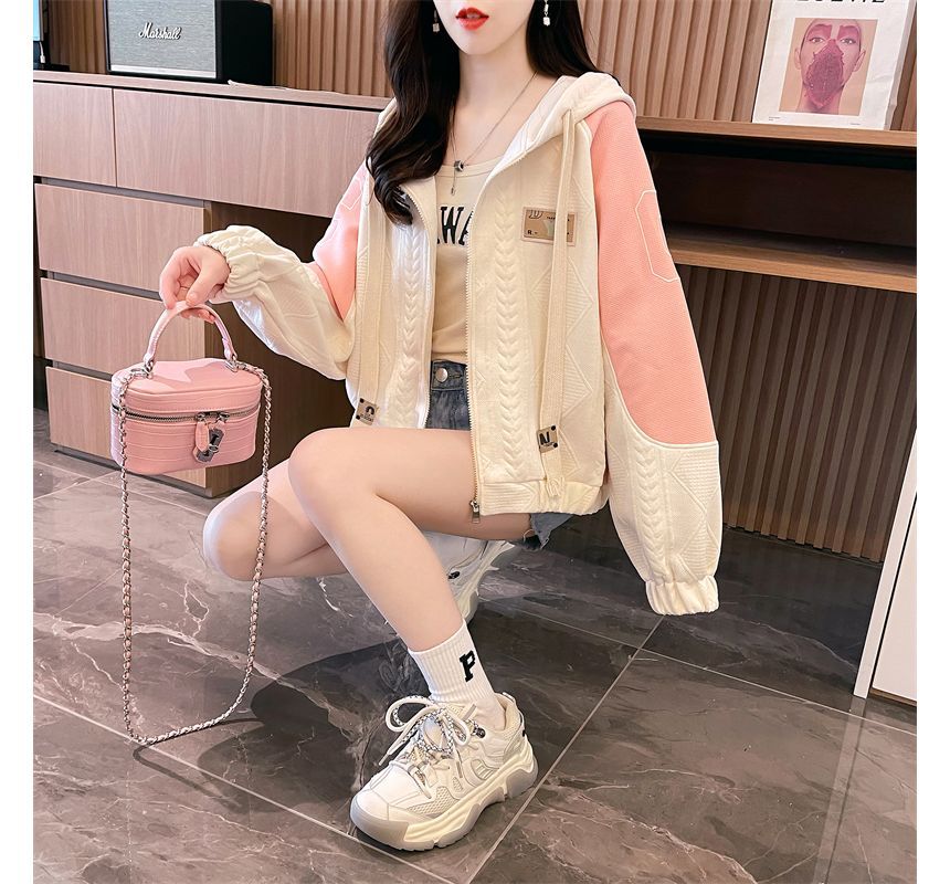 Jewie - Oversized hoodie met geborduurde letters en tweekleurige rits