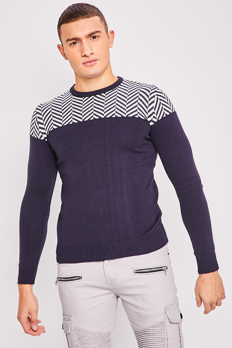 Pull bleu en maille à motifs blancs