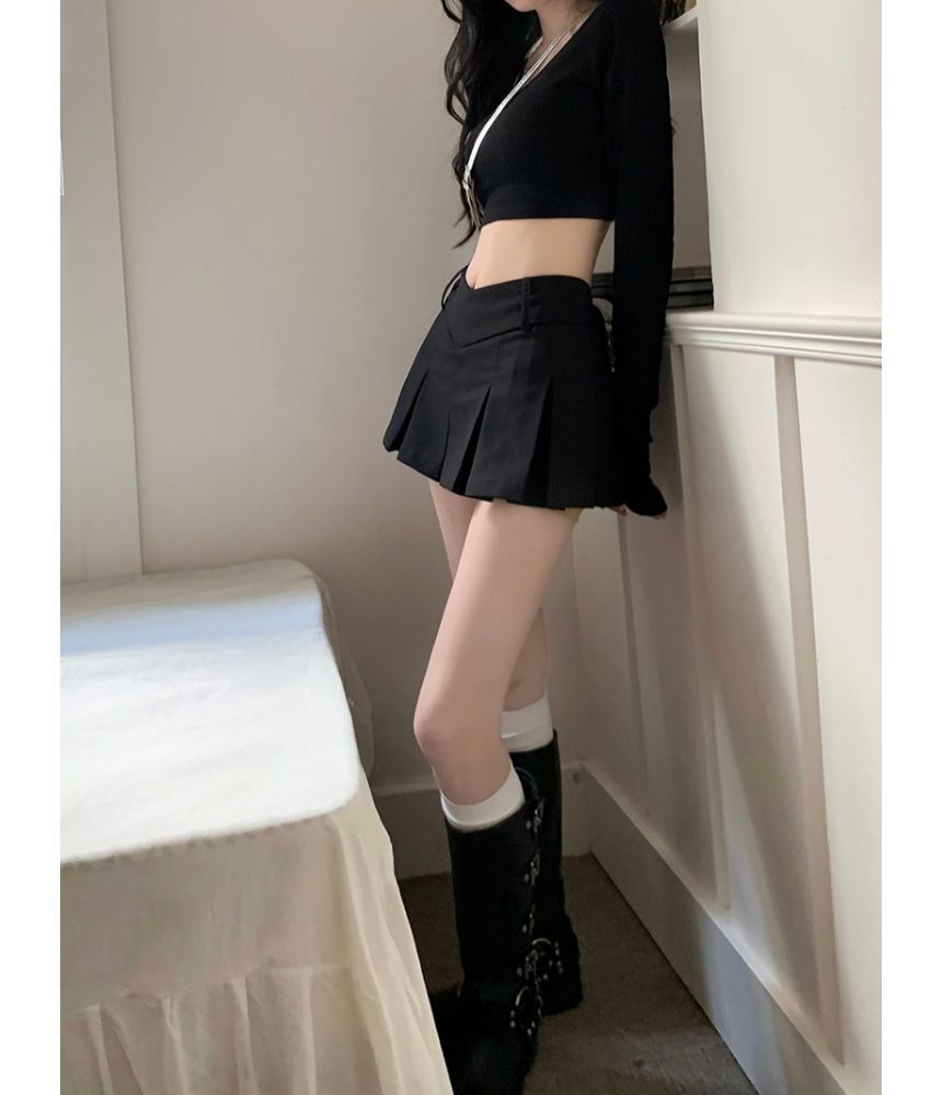 Monroll - Lange mouwen, ronde hals, effen crop top / Mid-rise effen geplooide minirok