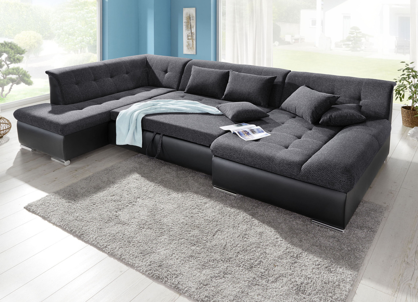 Wohnlandschaft mit Bettfunktion