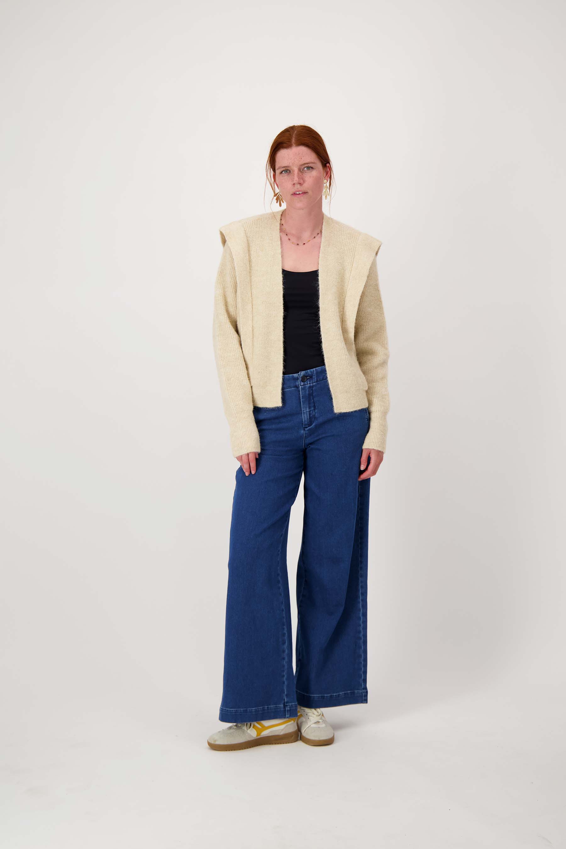 vest met schouder detail
