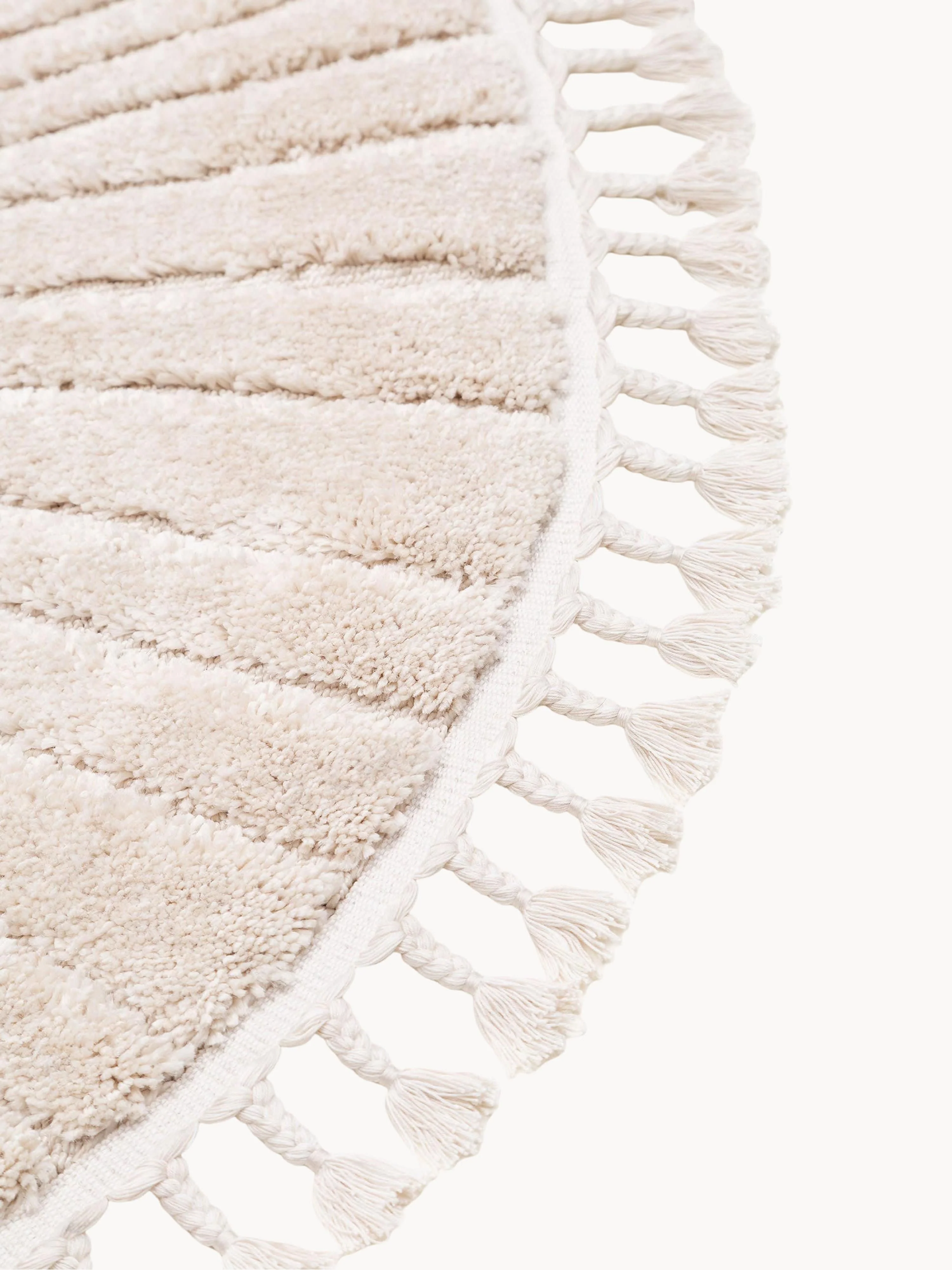Rond kindervloerkleed Momo met kwastjes en hoog-laag effect